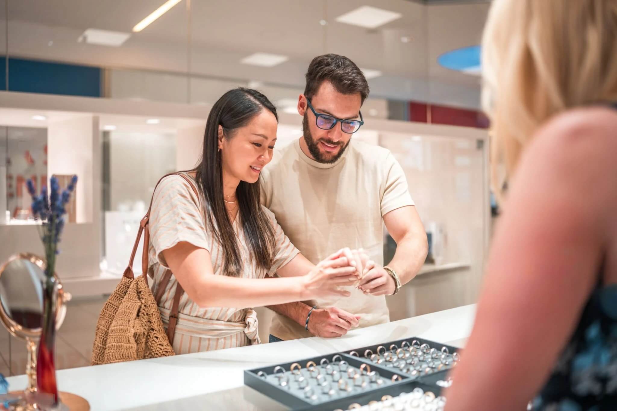 A couple shopping at a jewelry store